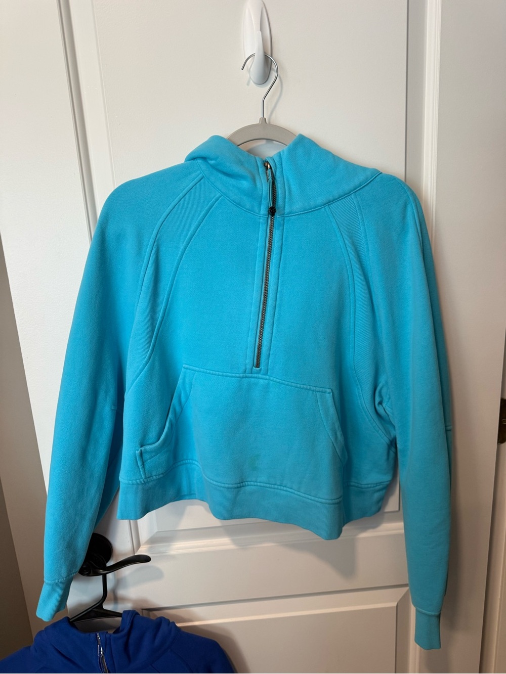 lululemon Turquoise scuba
SIZE M/L 
*small stain on front pocket shown in pic